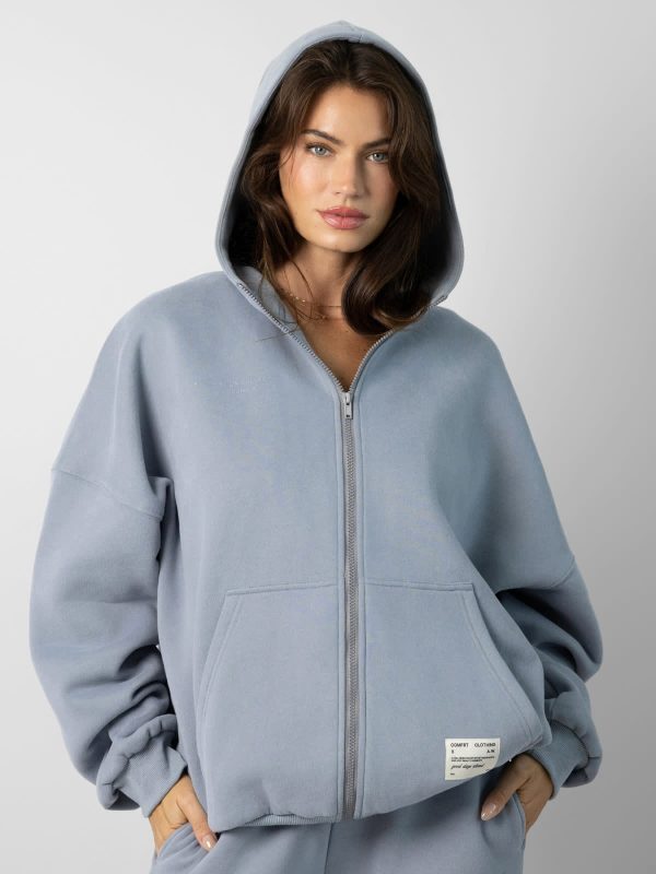 Affirmation Zip Hoodie: Lauren is 5'8" and wears a size M